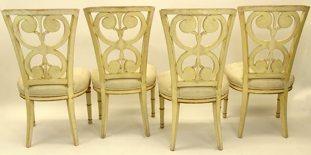 Set of Four (4) Mid 20th Century Italian Neoclassical style Carved Painted and Parcel Gilt Side Chairs.