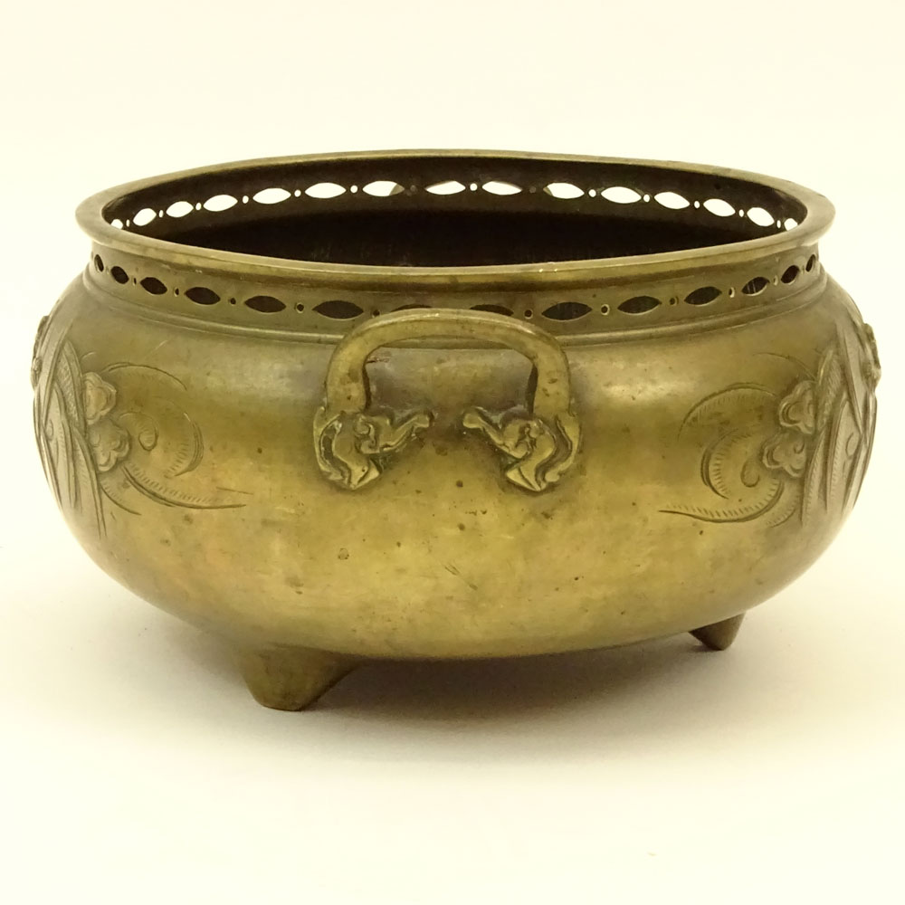 Large 18/19th Century Chinese Bronze Censer. Tri-Footed relief of dragons and clouds motif. Pierced rim.