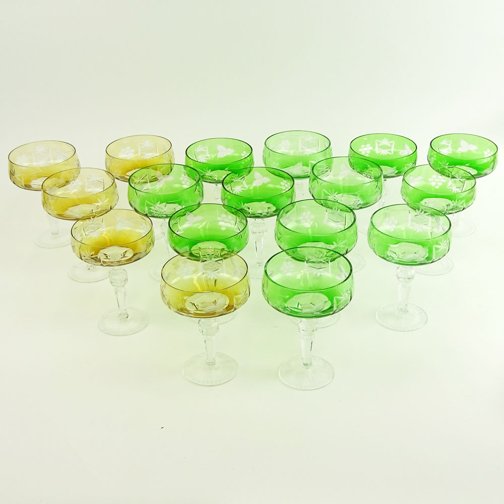 Lot of 17 Bohemian Cut Glass Champagne Coupes in Green (12) and Amber (5).