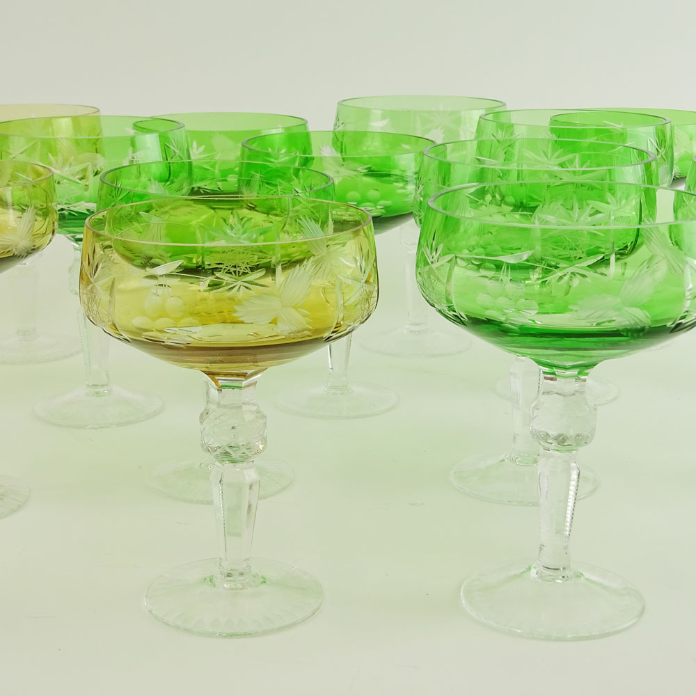 Lot of 17 Bohemian Cut Glass Champagne Coupes in Green (12) and Amber (5).