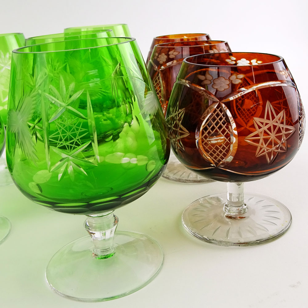 Lot of 9 Bohemian Cut Glass Brandy glasses in Green and Deep Orange.