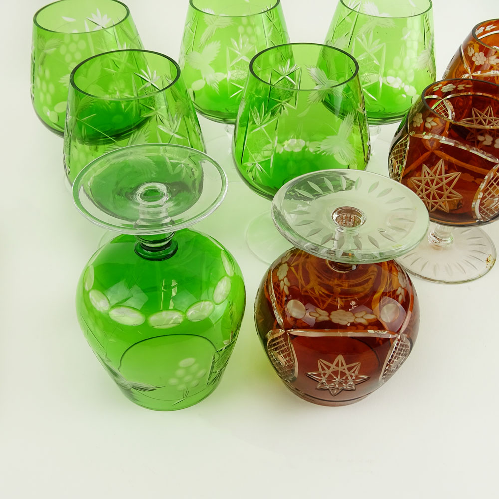 Lot of 9 Bohemian Cut Glass Brandy glasses in Green and Deep Orange.