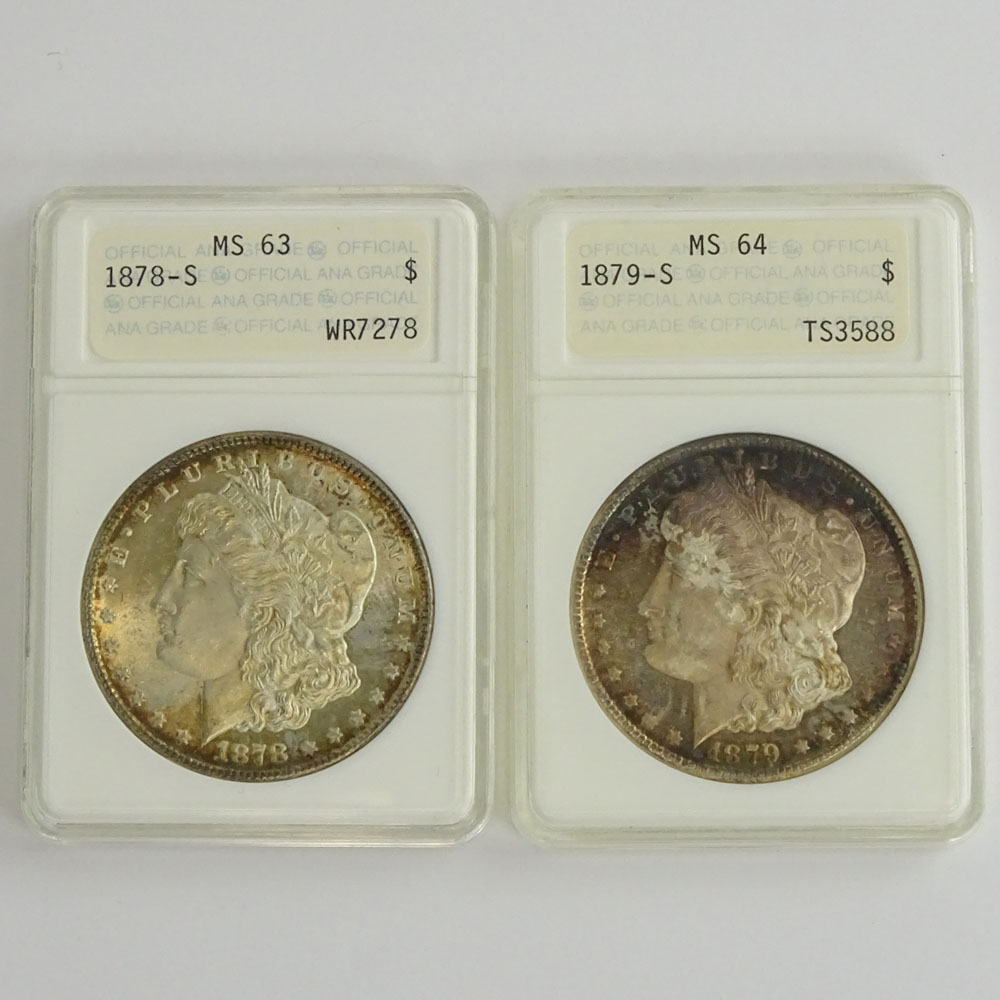 Two (2) Morgan Silver Dollars.