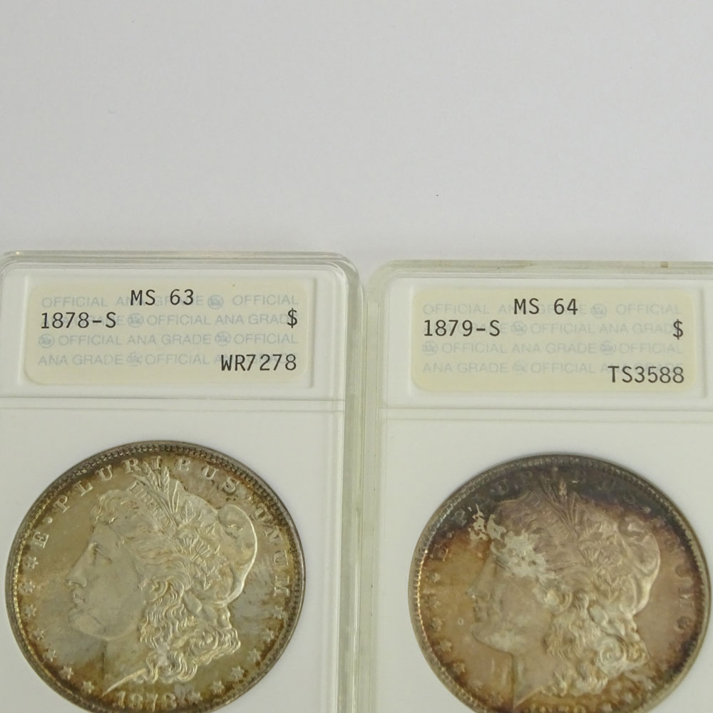 Two (2) Morgan Silver Dollars.