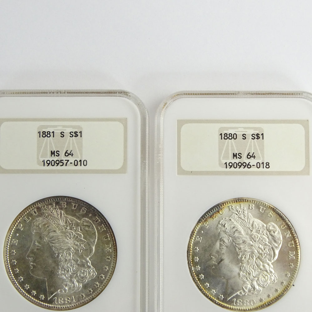 Two (2) Morgan Silver Dollars.