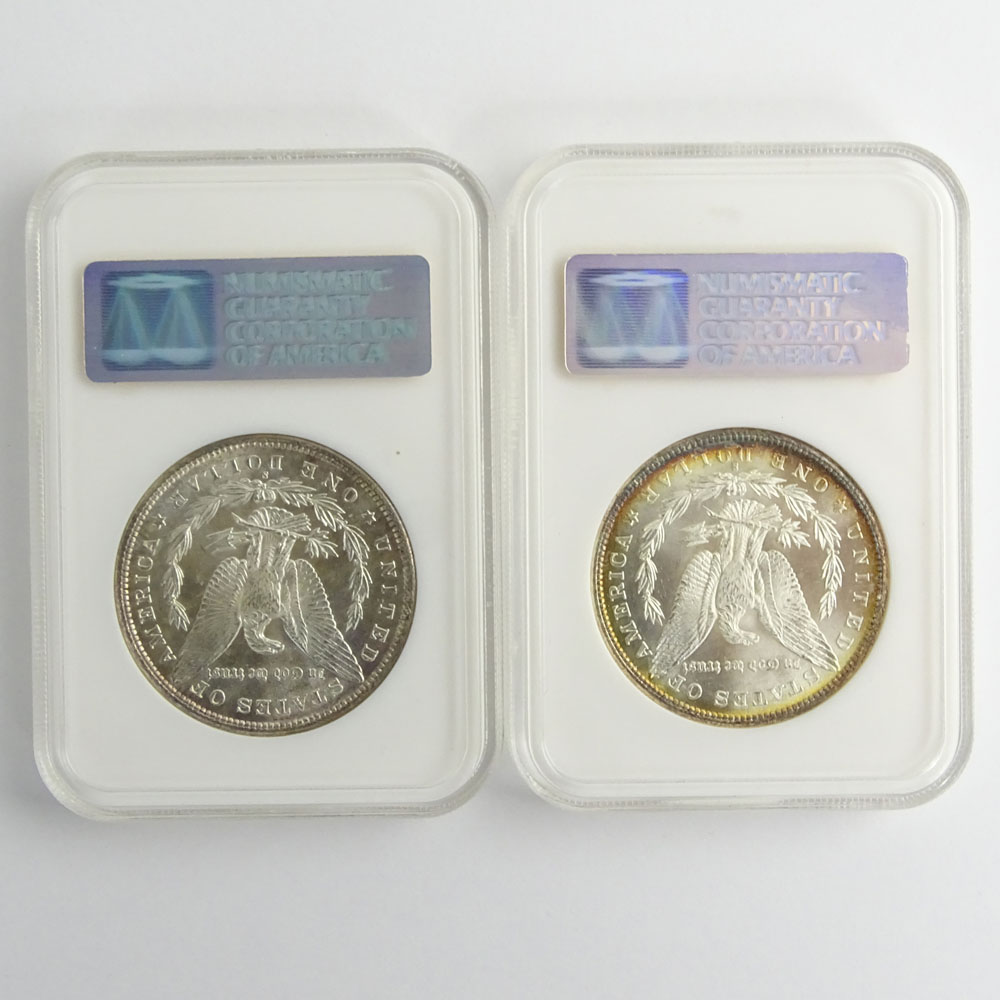 Two (2) Morgan Silver Dollars.