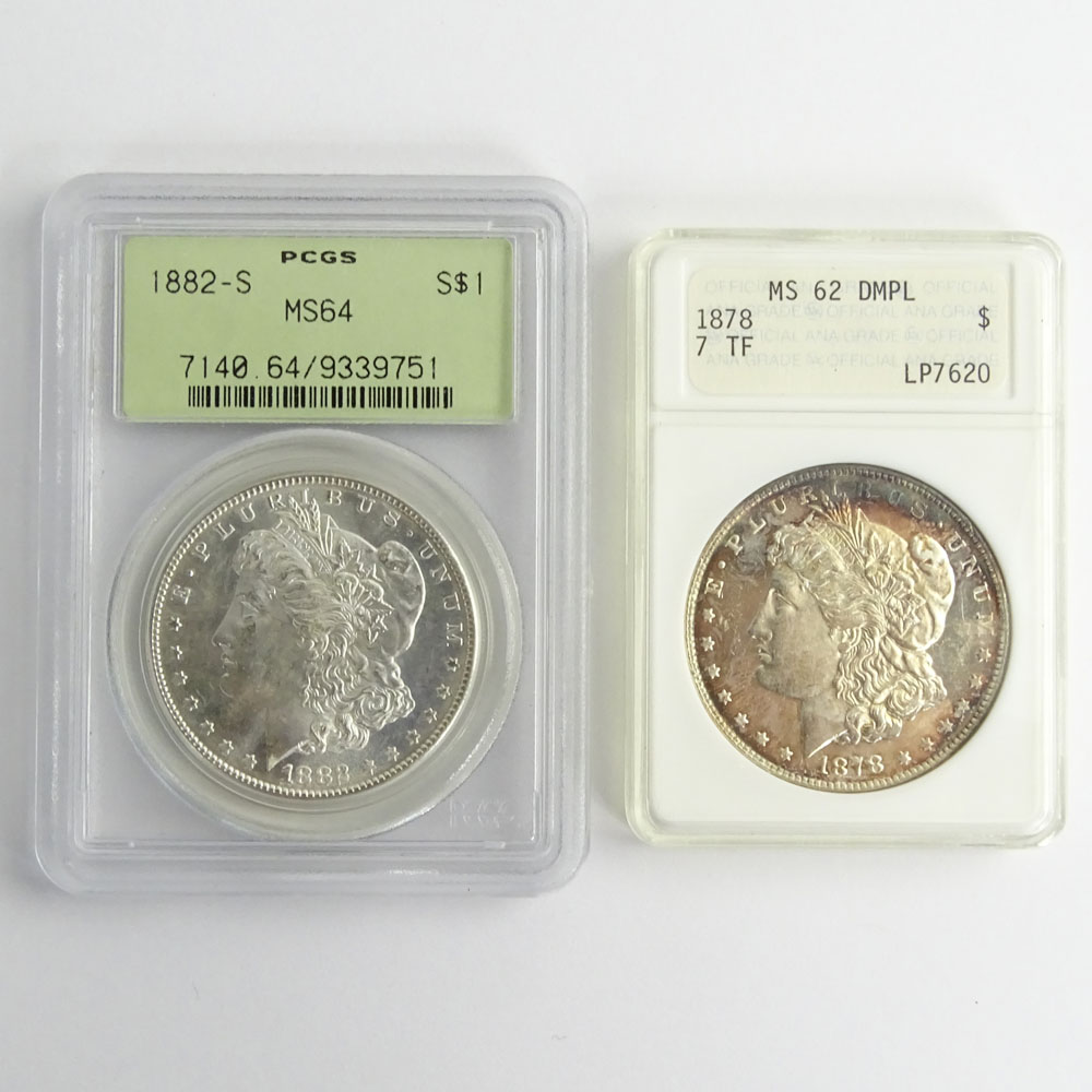 Two (2) Morgan Silver Dollars.