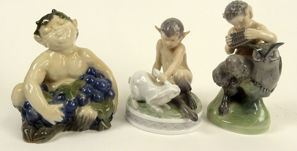 Lot of Three (3) Royal Copenhagen Porcelain Satyr Figurines in Various Poses with bunny and flute.