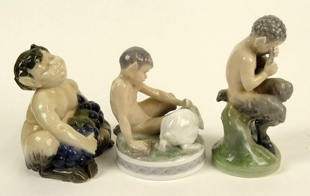 Lot of Three (3) Royal Copenhagen Porcelain Satyr Figurines in Various Poses with bunny and flute.