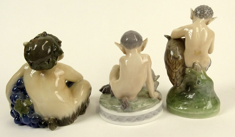 Lot of Three (3) Royal Copenhagen Porcelain Satyr Figurines in Various Poses with bunny and flute.