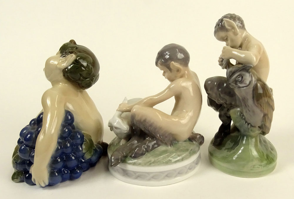 Lot of Three (3) Royal Copenhagen Porcelain Satyr Figurines in Various Poses with bunny and flute.