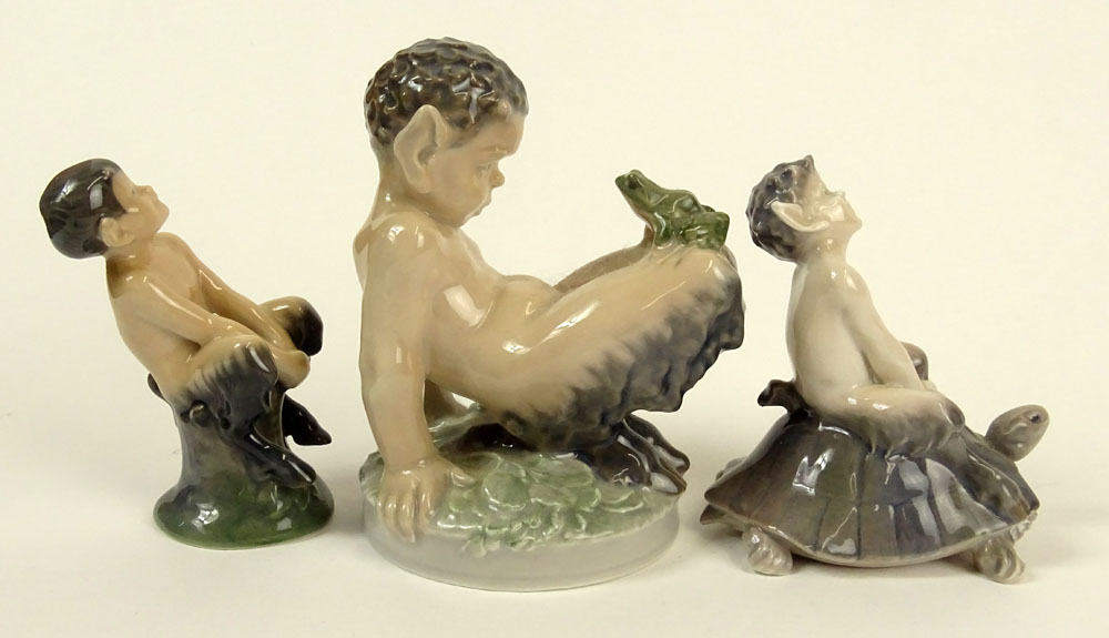 Lot of Three (3) Royal Copenhagen Porcelain Satyr Figurines in Various Poses with frogs and turtles.