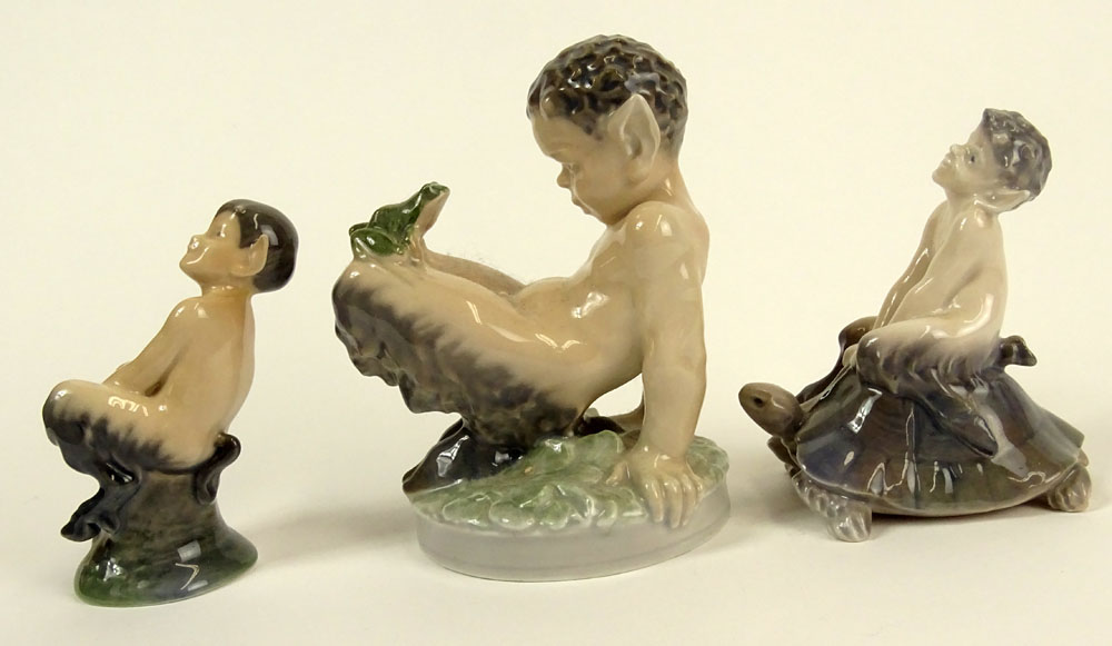 Lot of Three (3) Royal Copenhagen Porcelain Satyr Figurines in Various Poses with frogs and turtles.