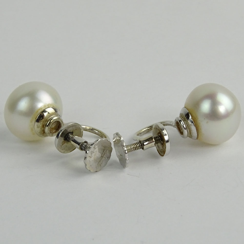 Circa 1974 Bulgari White Pearl and 14 Karat White Gold Earrings in Original Bulgari Box.