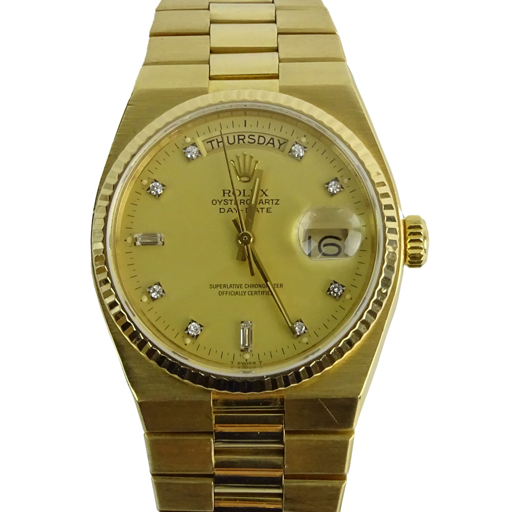 Men's 18 Karat Yellow Gold Rolex Oyster Quartz Day Date Watch.