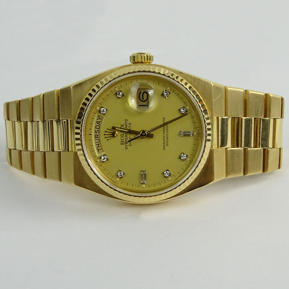 Men's 18 Karat Yellow Gold Rolex Oyster Quartz Day Date Watch.