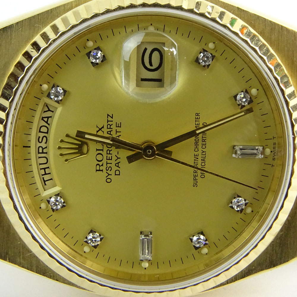 Men's 18 Karat Yellow Gold Rolex Oyster Quartz Day Date Watch.