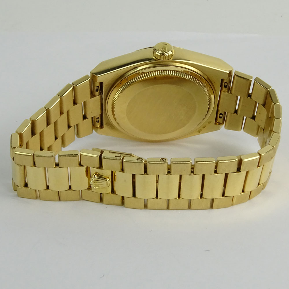 Men's 18 Karat Yellow Gold Rolex Oyster Quartz Day Date Watch.