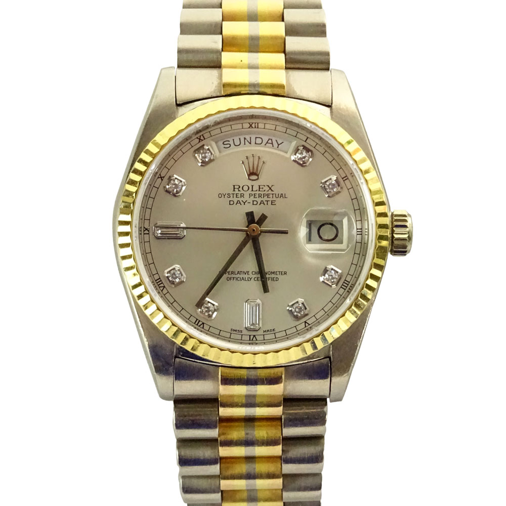 Men's Rolex 18 Karat Gold Tridor Oyster Perpetual Day Date President Chronometer watch.