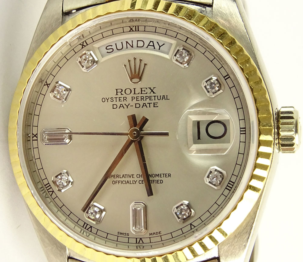 Men's Rolex 18 Karat Gold Tridor Oyster Perpetual Day Date President Chronometer watch.