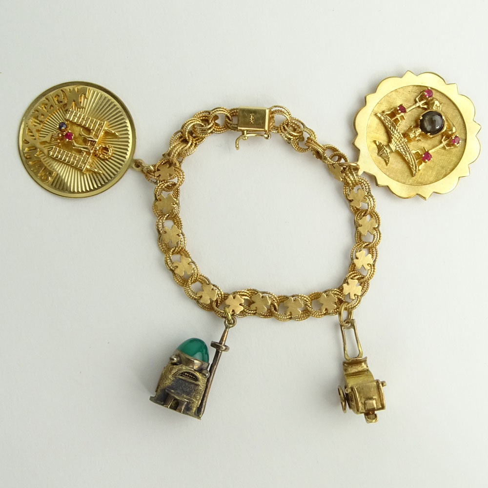 Vintage 14 Karat Yellow Gold Charm Bracelet with Four (4) Charms.