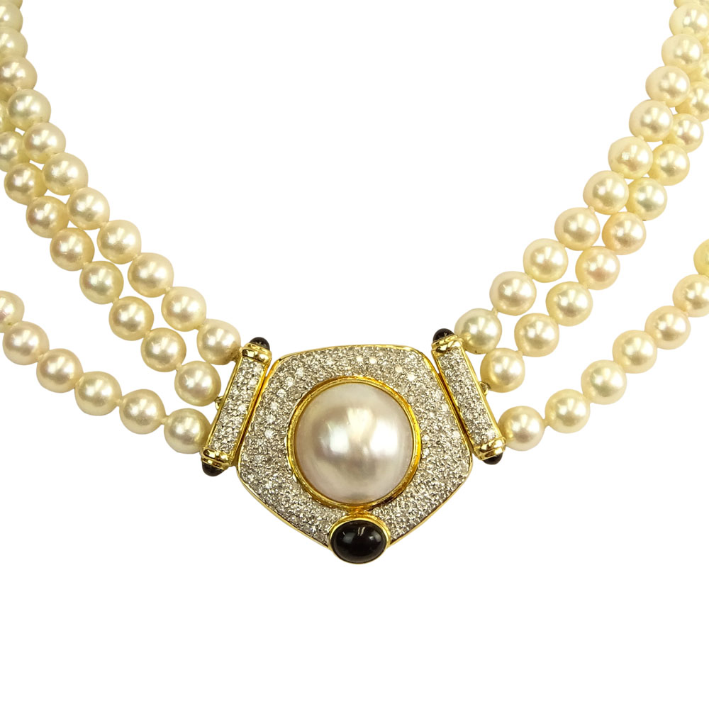 Vintage Three (3) Strand White Pearl Necklace with 14 Karat Yellow Gold Clasp.