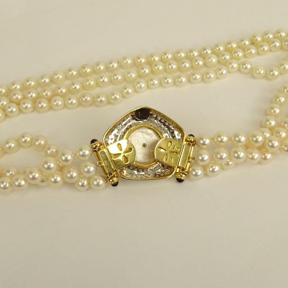 Vintage Three (3) Strand White Pearl Necklace with 14 Karat Yellow Gold Clasp.