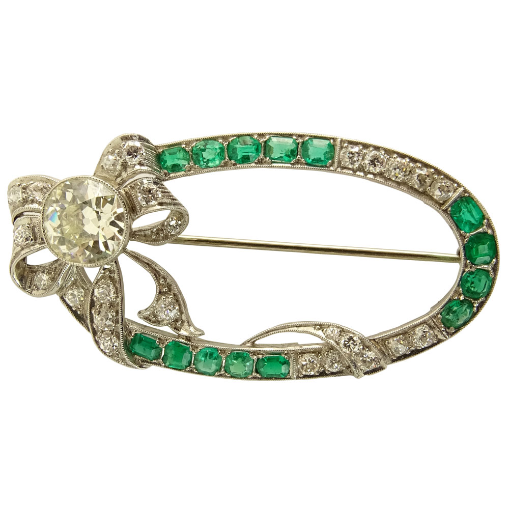 Art Deco Approx. 3.0 Carat Diamond, 1.50 Carat Emerald and Platinum Brooch set with approx. 2.15 Carat Diamond. 