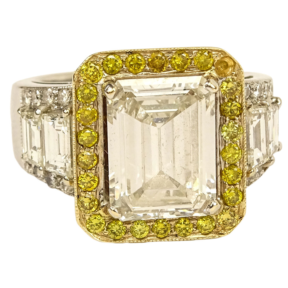GIA Certified 3.40 Carat Emerald Cut Diamond and 18 Karat White Gold Engagement Ring Bezel Set.