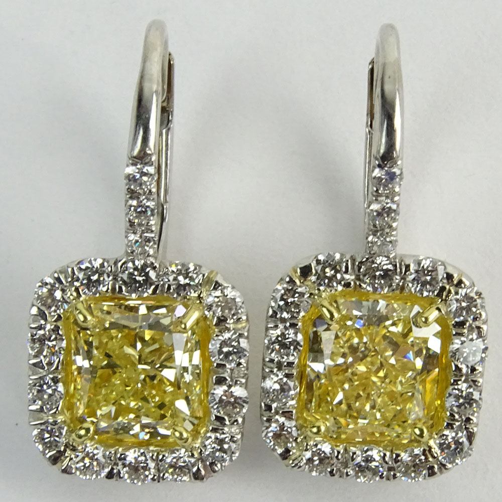 3.01 Carat Radiant Cut Fancy Intense Yellow Diamond, Platinum and 18 Karat Yellow Gold Dangle Earrings