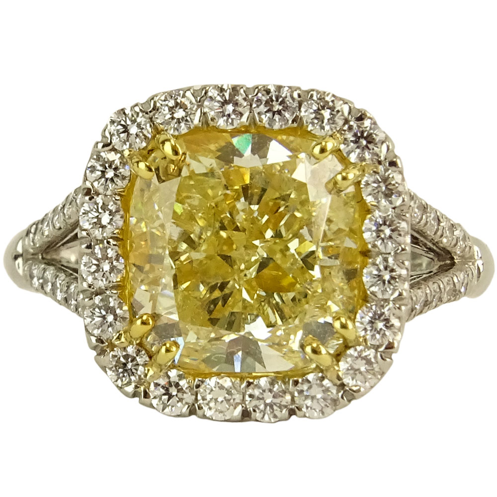 5.03 Carat Radiant Cut Fancy Intense Yellow Diamond, Platinum and 18 Karat Yellow Gold Engagement Ring 