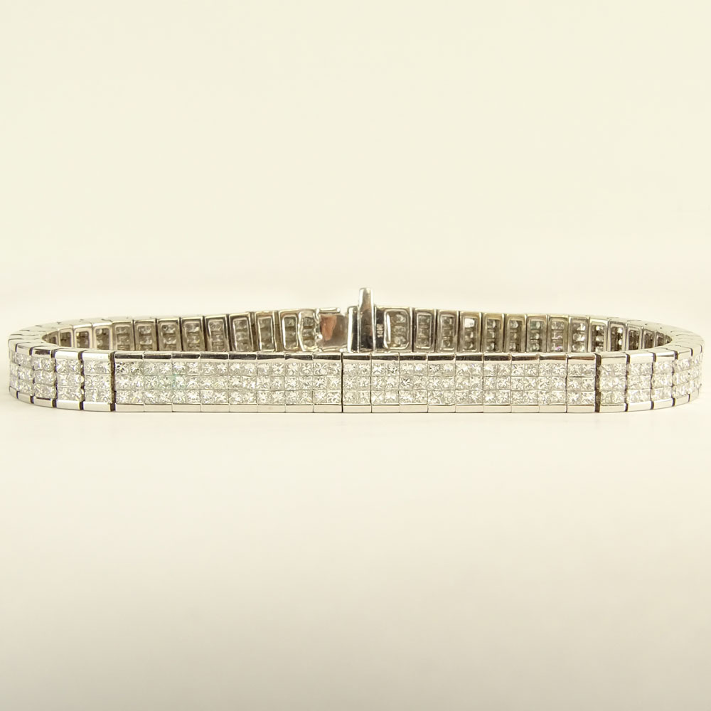 Fine Quality Approx. 10.0 Carat Invisible Set Diamond and 14 Karat White Gold Flexible Bracelet.