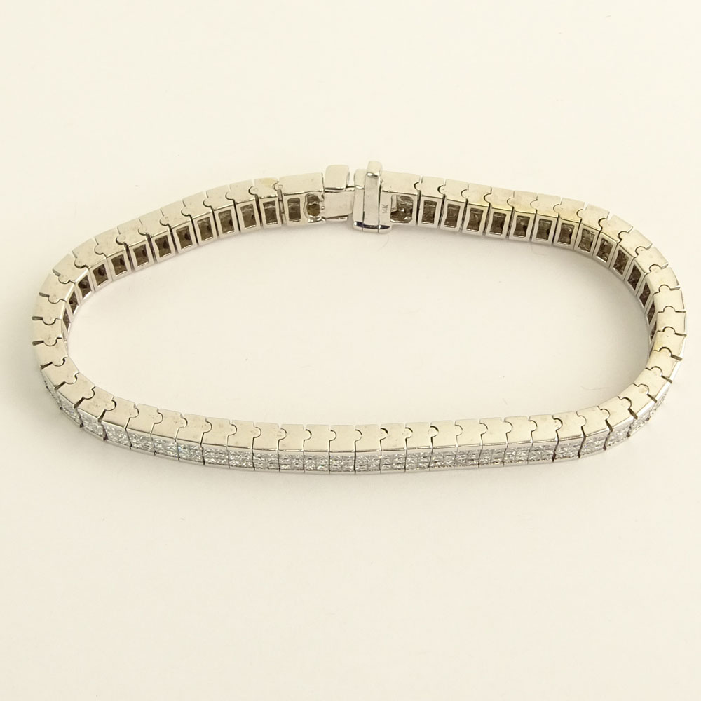 Fine Quality Approx. 10.0 Carat Invisible Set Diamond and 14 Karat White Gold Flexible Bracelet.