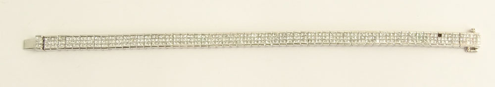 Fine Quality Approx. 10.0 Carat Invisible Set Diamond and 14 Karat White Gold Flexible Bracelet.