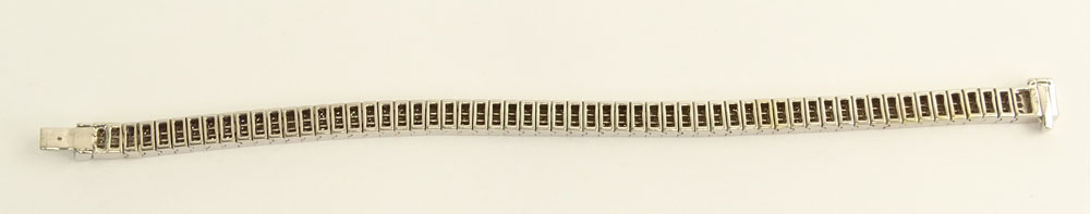 Fine Quality Approx. 10.0 Carat Invisible Set Diamond and 14 Karat White Gold Flexible Bracelet.