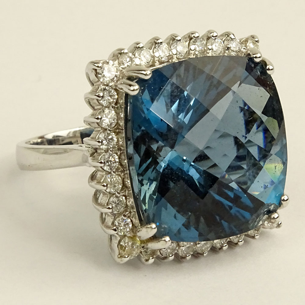 Lady's Cushion Cut London Topaz, Round Cut Diamond and 14 Karat White Gold Ring.