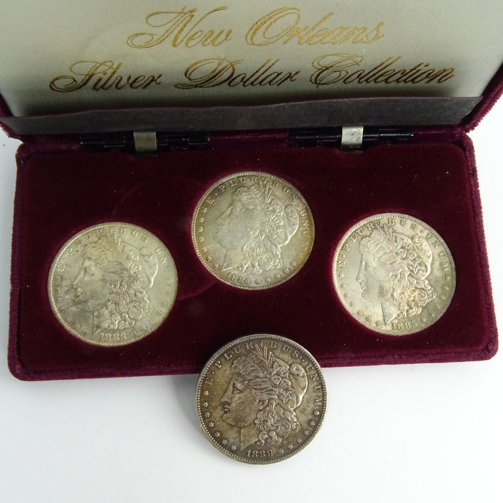 Collection of Four (4) New Orleans Morgan Silver Dollars.