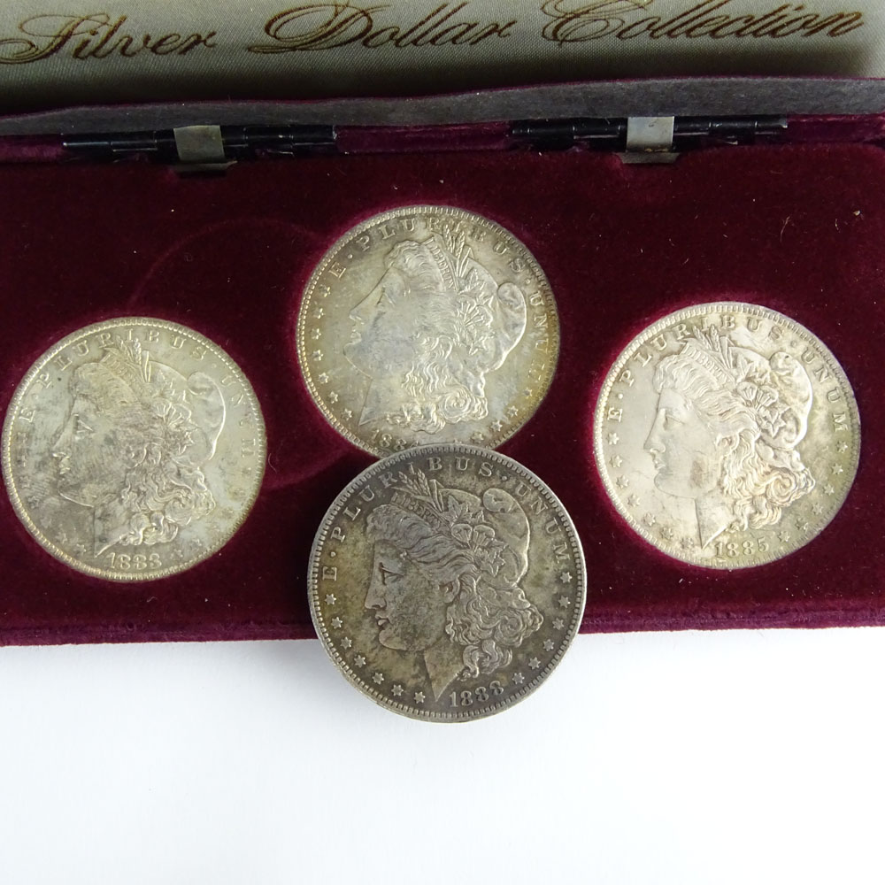 Collection of Four (4) New Orleans Morgan Silver Dollars.