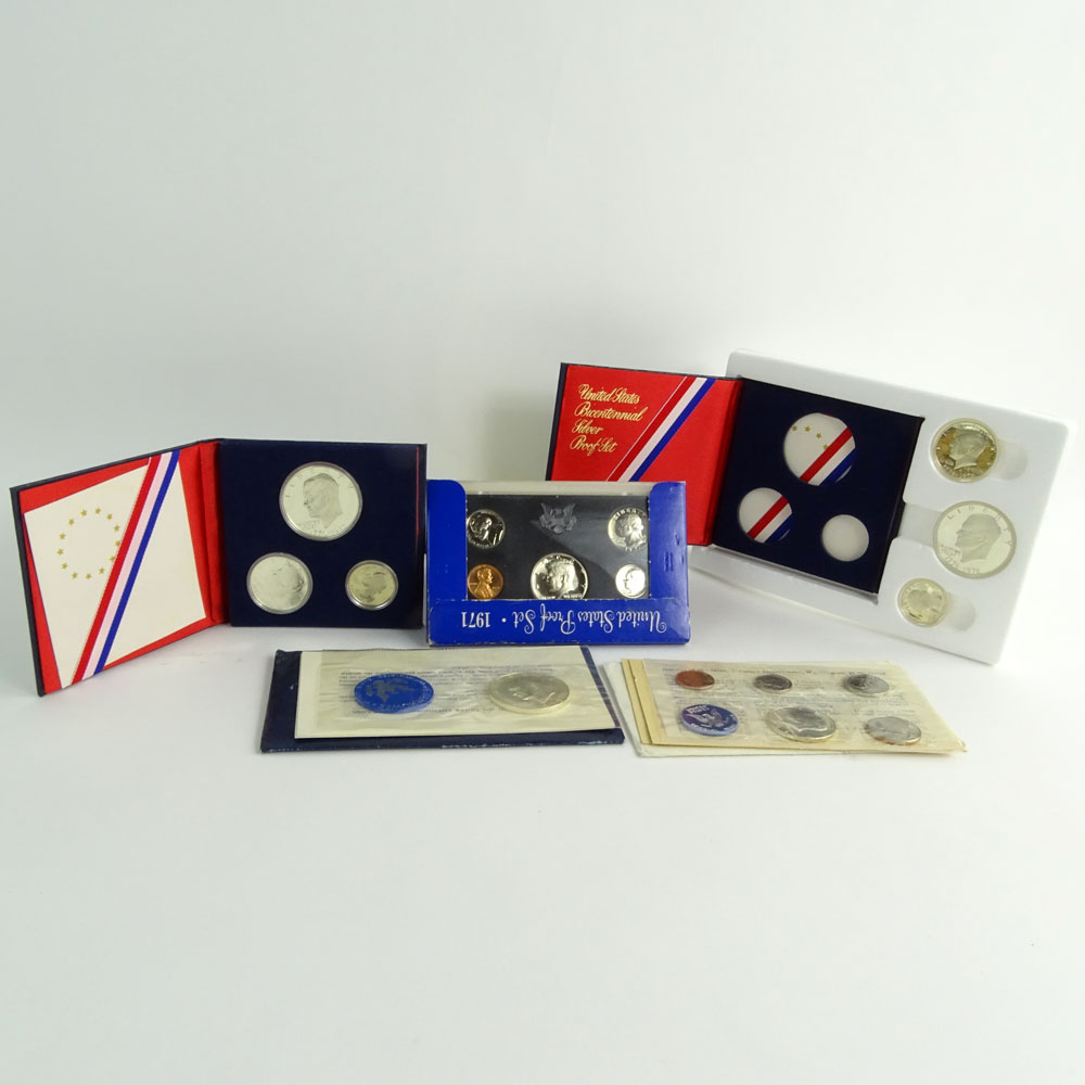 Collection US Proof Coin Sets and Uncirculated Eisenhower Dollar Coins.