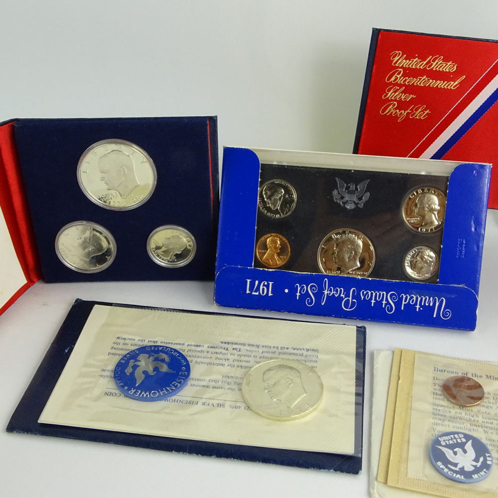 Collection US Proof Coin Sets and Uncirculated Eisenhower Dollar Coins.