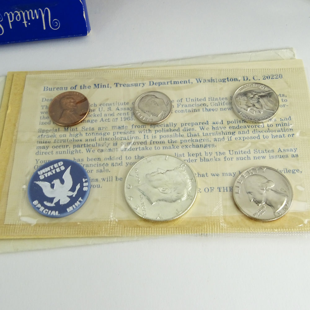 Collection US Proof Coin Sets and Uncirculated Eisenhower Dollar Coins.