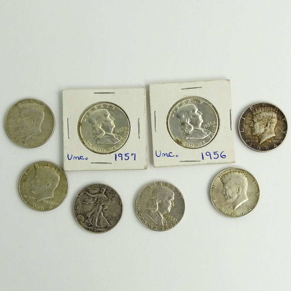 Lot of Eight (8) Half Dollar Coins.
