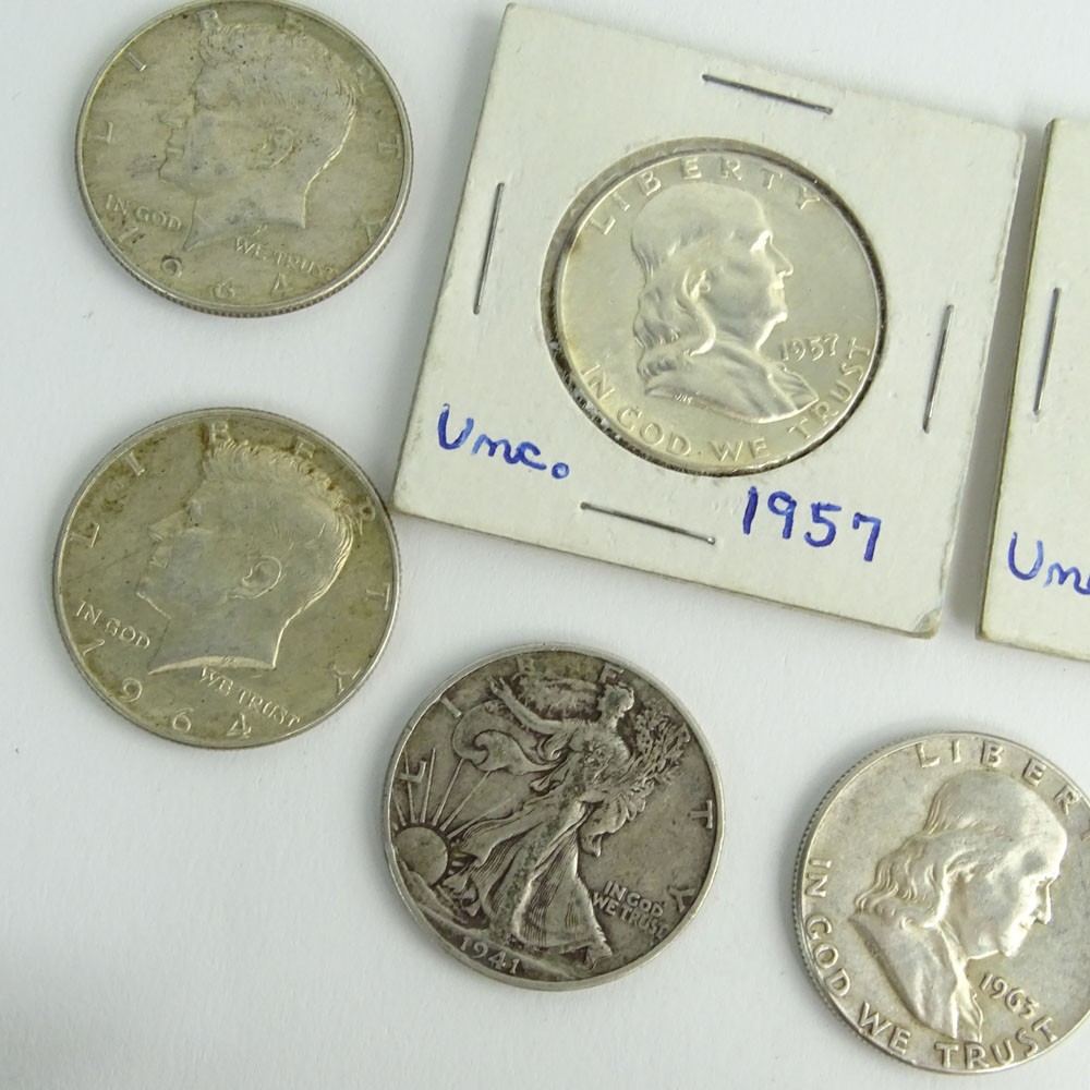 Lot of Eight (8) Half Dollar Coins.