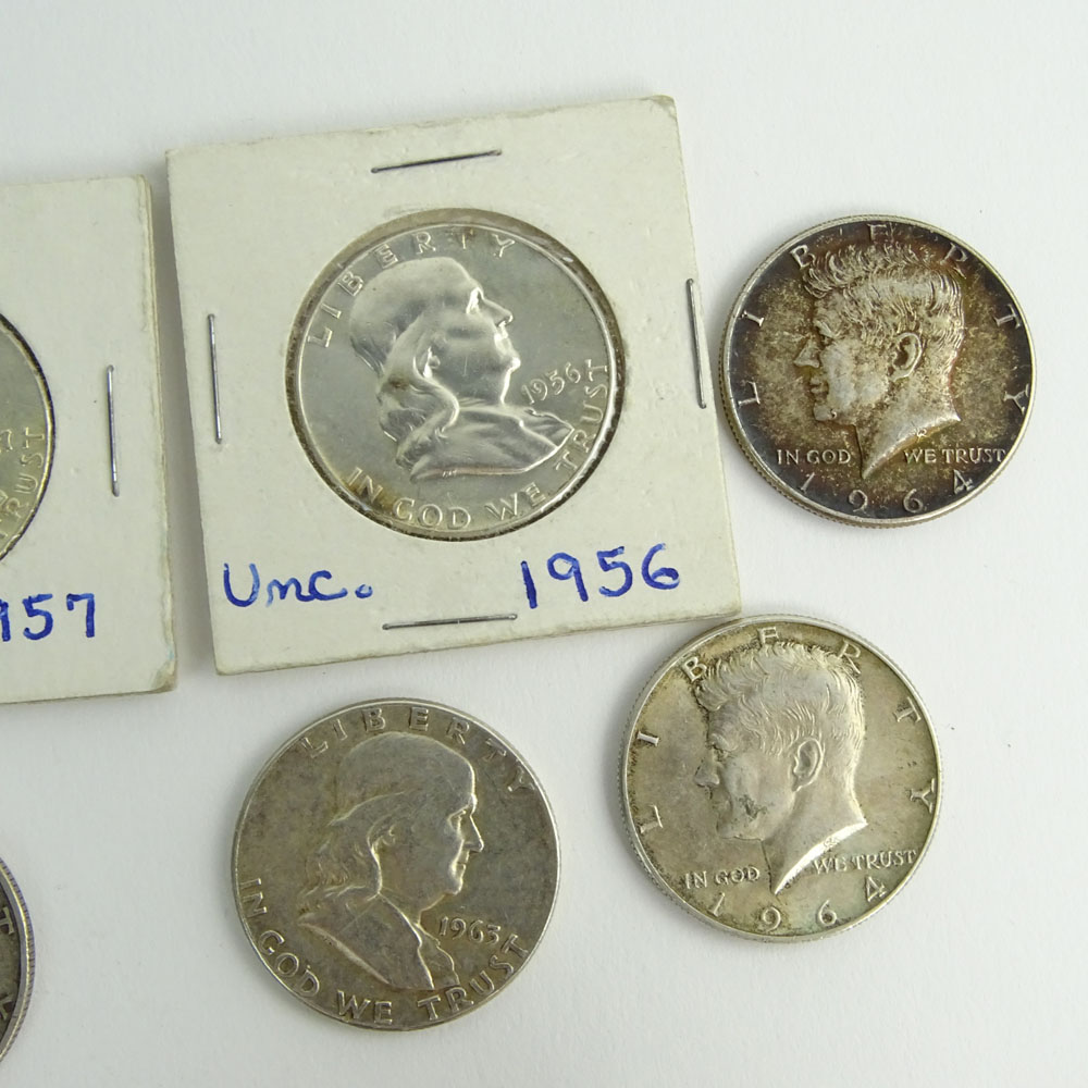 Lot of Eight (8) Half Dollar Coins.