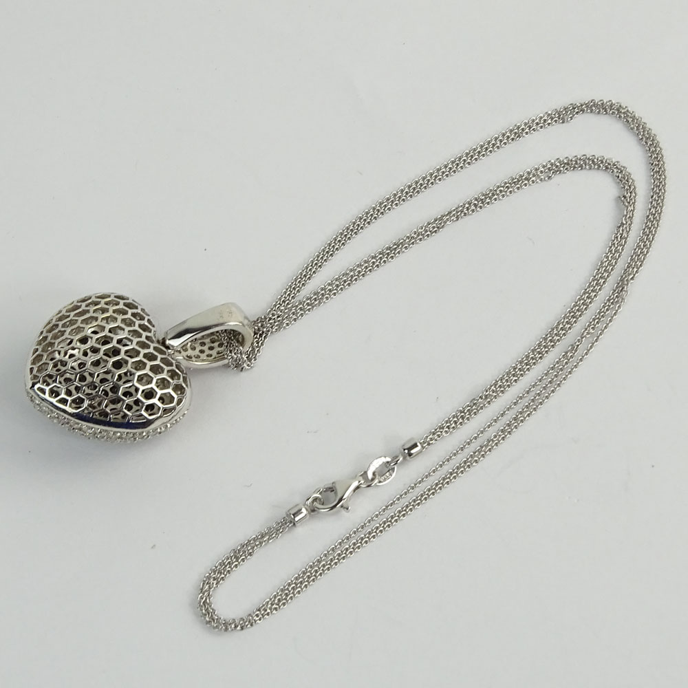 4.75 Carat Round Cut Black & White Diamond and 18 Karat White Gold Heart Pendant Necklace.