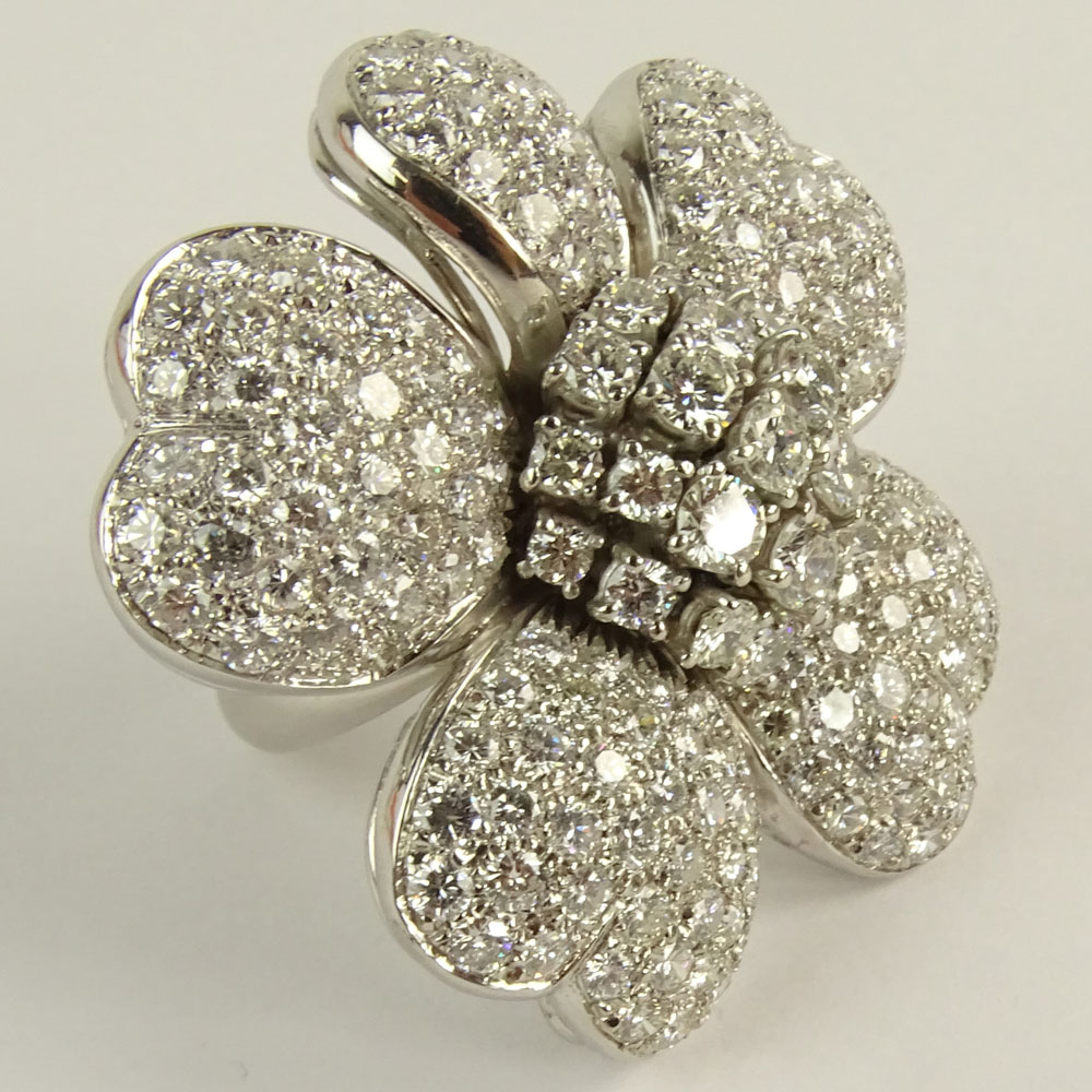 Lady's Approx. 12.0 Carat Round Brilliant Cut Diamond and 18 Karat White Gold Flower Ring.