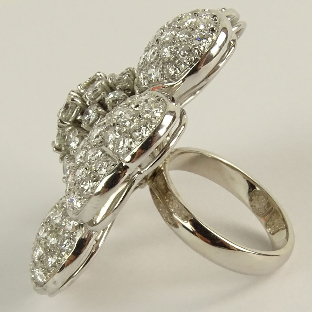 Lady's Approx. 12.0 Carat Round Brilliant Cut Diamond and 18 Karat White Gold Flower Ring.