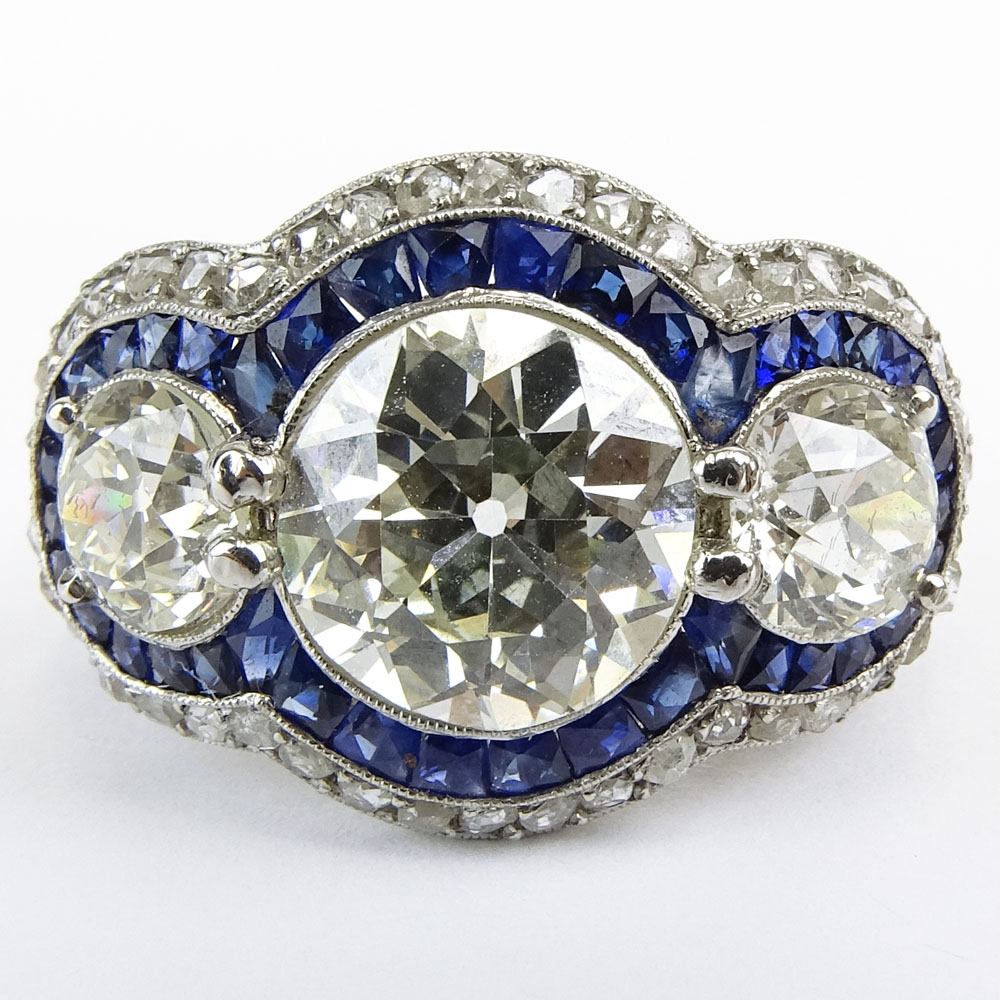 Stunning Art Deco Design Approx. 3.51 Carat Center Stone European Cut Diamond, Sapphire and Platinum Three Stone Engagement Ring.