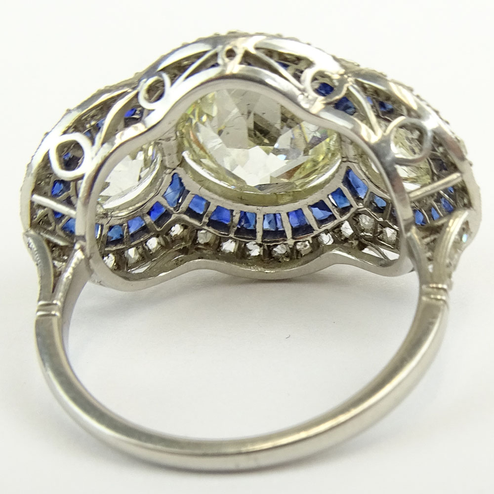 Stunning Art Deco Design Approx. 3.51 Carat Center Stone European Cut Diamond, Sapphire and Platinum Three Stone Engagement Ring.