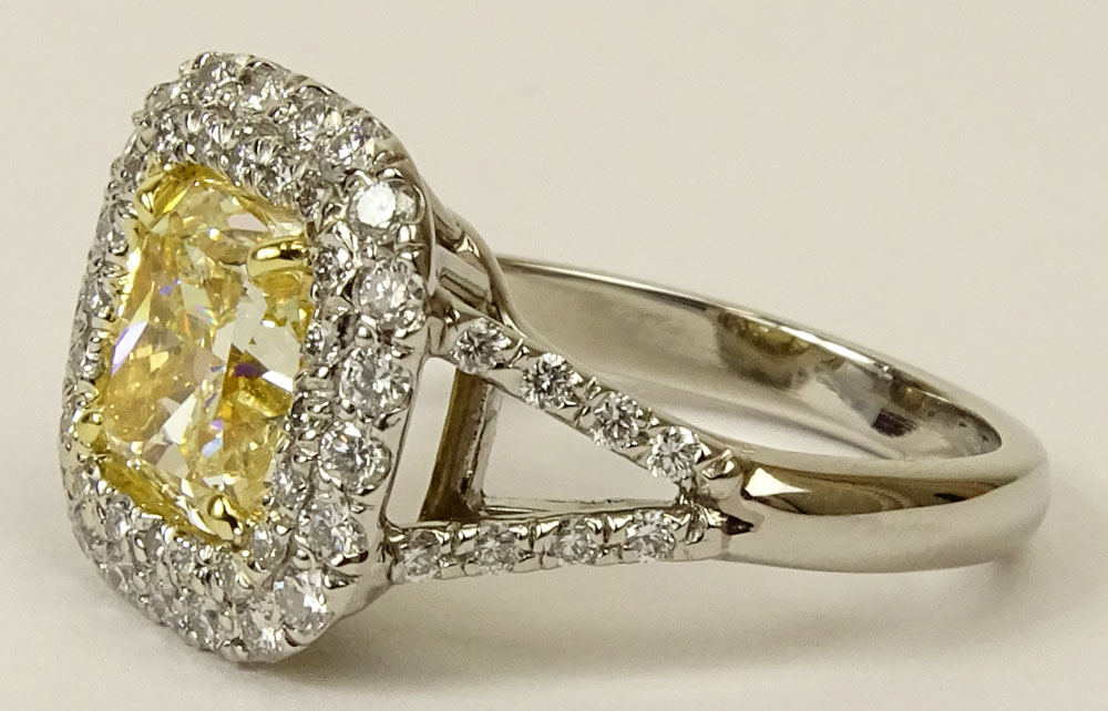 EGL Certified 2.14 Carat Cushion Cut Fancy Intense Yellow Diamond and Platinum Engagement Ring